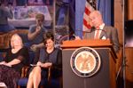 George Washington University Professor Michael Moore of presenting his views on the Commission's economic analysis.  Shown with Commissioner Rhonda Schmidtlein and Thelma Askey (right to left).