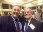 Alexander Hammer (USITC) and Paul Bardos (USITC Alum) enjoying themselves at the Centennial reception.  