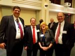 Stephen Dove, Tom Jarvis (USITC Alum), Juliana Cofrancesco (USITC), and Kent Stevens (USITC Alum) at the Centennial reception.   