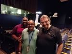 The USITC technical crew prepare the Voice of America auditorium for the Centennial Conference. Shown from left to right are Keith Johnson, Tyrone Coward, and Gary Waldock. 