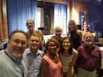 USITC Conference Planners prepare the Voice of America auditorium for the Centennial Conference. Shown  top row , from left to right Lyn Schlitt, Natalie Hanson, and Silvia Galluch. Bottom row, from left to right  Alexander Hammer, John Ascienzo, Lisa Barton, Katherine Hiner, and Paul Bardos